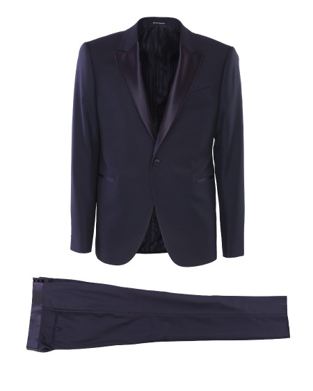 Shop EMPORIO ARMANI  Smoking: Emporio Armani tuxedo.
Collar with lapels.
1 button.
Three pockets.
Lined interior.
Trousers with four pockets.
Double back vent.
Composition: 61% Polyester 48% Wool 1% Elastane.
Made in Bulgaria.. D41VMU D1623-922